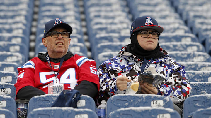 Nov 2, 2014; Foxborough, MA, USA; Patriots fans sit in snow covered seats before the start of the game against the New England Patriots and Denver Broncos at Gillette Stadium. Nov 2, 2014; Foxborough, MA, USA; Patriots fans sit in snow covered seats before the start of the game against the New England Patriots and Denver Broncos at Gillette Stadium.