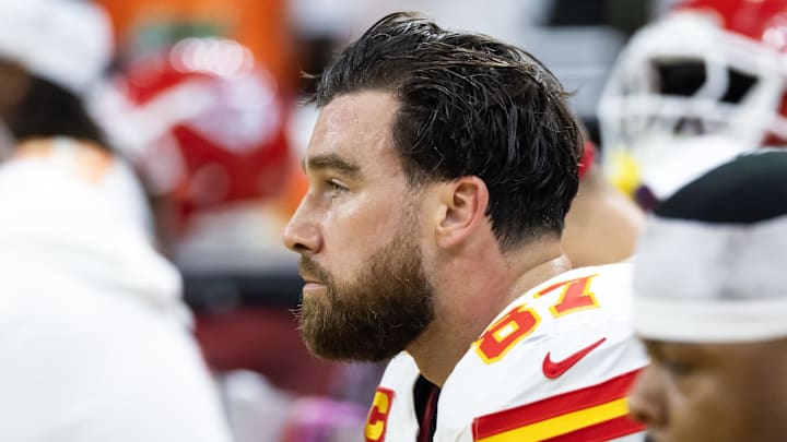 Feb 9, 2025; New Orleans, LA, USA;  Kansas City Chiefs tight end Travis Kelce (87) reacts on the bench in the fourth quarter against the Philadelphia Eagles in Super Bowl LIX at Ceasars Superdome. Mandatory Credit: Mark J. Rebilas-Imagn Images