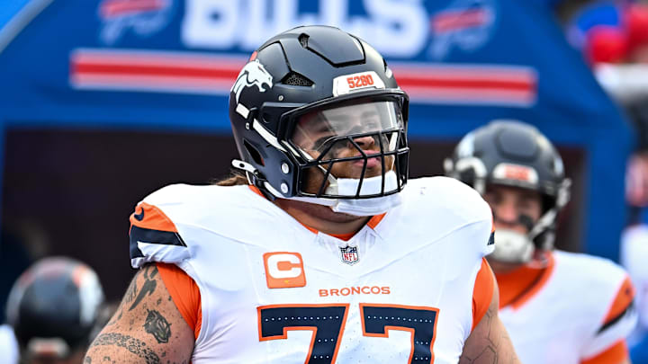 Jan 12, 2025; Orchard Park, New York, USA; Denver Broncos guard Quinn Meinerz (77) enters the field before an AFC wild card game against the Buffalo Bills at Highmark Stadium. Mandatory Credit: Mark Konezny-Imagn Images