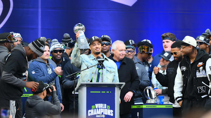 Feb 11, 2026; Seattle, WA, USA; Seattle Seahawks wide receiver Jaxon Smith-Njigba (11) talks to fans during the Super Bowl LX trophy presentation at Lumen Field. Mandatory Credit: Steven Bisig-Imagn Images