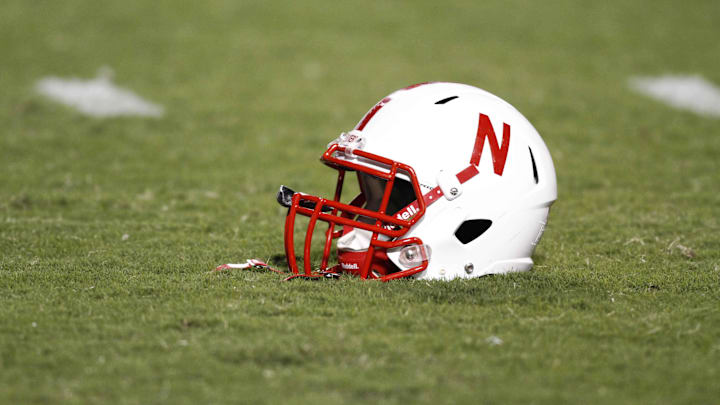 A Nebraska Cornhuskers helmet on the field before a game