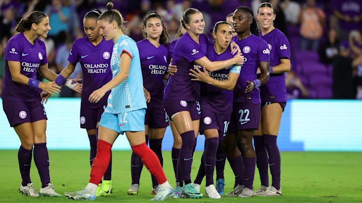 Orlando Pride forward Marta (10) celebrates with midfielder Coriana Dyke (31) after scoring a goal against the Chicago Red Stars in the second half in a 2024 NWSL Playoffs quarterfinal match at Inter&Co Stadium 