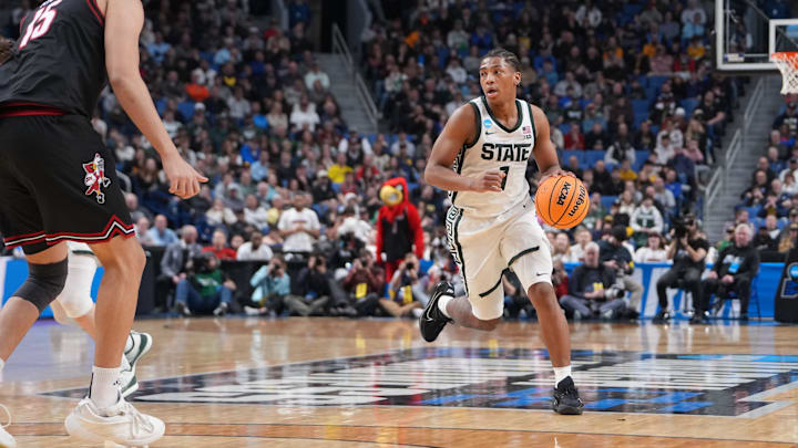 Mar 21, 2026; Buffalo, NY, USA; Michigan State Spartans guard Jeremy Fears Jr. (1) moves the ball in the second half against the Louisville Cardinals during a second round game of the men's 2026 NCAA Tournament at Keybank Center. Mandatory Credit: Gregory Fisher-Imagn Images