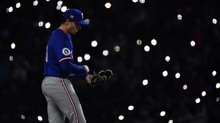 May 11, 2024; Denver, Colorado, USA; Texas Rangers pitcher Cole Winn (60) enters the game against the Colorado Rockies in the seventh inning at Coors Field. 