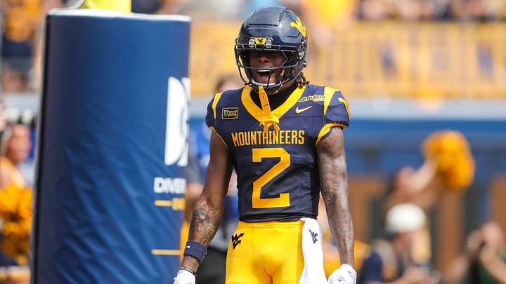 Sep 12, 2026; Morgantown, West Virginia, USA;  West Virginia Mountaineers wide receiver DJ Epps (2) celebrates after catching a pass for a touchdown during the first quarter against the UT Martin Skyhawks at Milan Puskar Stadium.  Mandatory Credit: Ben Queen-Imagn Images