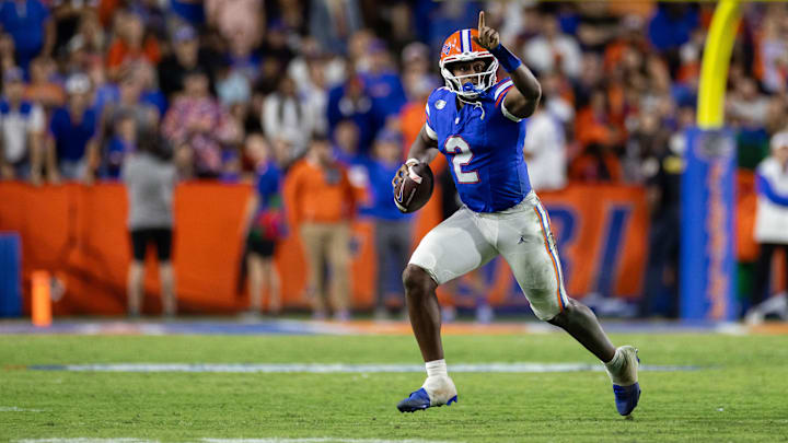 Oct 19, 2024; Gainesville, Florida, USA; Florida Gators quarterback DJ Lagway (2) gestures while running with the ball against the Kentucky Wildcats during the second half at Ben Hill Griffin Stadium. Mandatory Credit: Matt Pendleton-Imagn Images