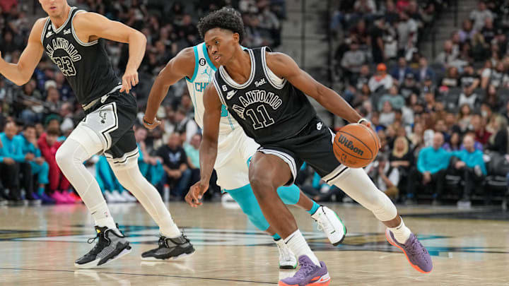 Oct 19, 2022; San Antonio, Texas, USA;  San Antonio Spurs guard Joshua Primo (11) dribbles the ball in the first half against the Charlotte Hornets at  the AT&T Center.