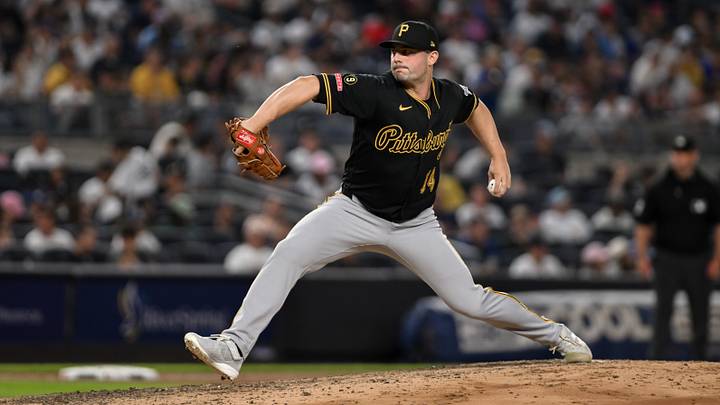 Jul 22, 2026; Bronx, New York, USA; Pittsburgh Pirates pitcher Brandon Eisert (14) pitches against the New York Yankees during the seventh inning at Yankee Stadium. Mandatory Credit: John Jones-Imagn Images
