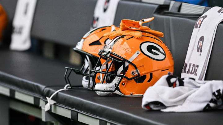 Dec 29, 2024; Minneapolis, Minnesota, USA; A Green Bay Packers helmet sits ready before the game against the Minnesota Vikings at U.S. Bank Stadium. Mandatory Credit: Jeffrey Becker-Imagn Images Dec 29, 2024; Minneapolis, Minnesota, USA; A Green Bay Packers helmet sits ready before the game against the Minnesota Vikings at U.S. Bank Stadium. Mandatory Credit: Jeffrey Becker-Imagn Images