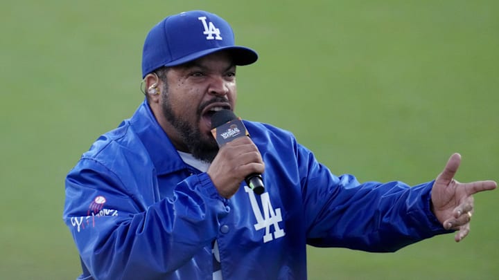 Oct 26, 2024; Los Angeles, California, USA; Recording artist Ice Cube performs on field before game two between the Los Angeles Dodgers and the New York Yankees in the 2024 MLB World Series at Dodger Stadium. Mandatory Credit: Kirby Lee-Imagn Images