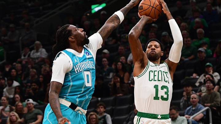 Oct 14, 2026; Boston, Massachusetts, USA; Boston Celtics forward Paul George (13) shoots the ball over Charlotte Hornets center Naz Reid (0) during the first half at TD Garden. Mandatory Credit: Bob DeChiara-Imagn Images Oct 14, 2026; Boston, Massachusetts, USA; Boston Celtics forward Paul George (13) shoots the ball over Charlotte Hornets center Naz Reid (0) during the first half at TD Garden. Mandatory Credit: Bob DeChiara-Imagn Images