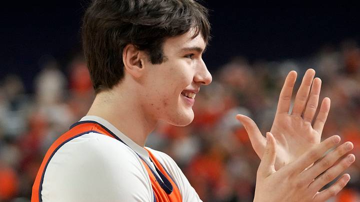 Illinois Fighting Illini forward David Mirkovic (0) reacts as he is introduced during practice ahead of a Final Four game on Friday, April 3, 2026, at Lucas Oil Stadium in Indianapolis. Illinois Fighting Illini forward David Mirkovic (0) reacts as he is introduced during practice ahead of a Final Four game on Friday, April 3, 2026, at Lucas Oil Stadium in Indianapolis.
