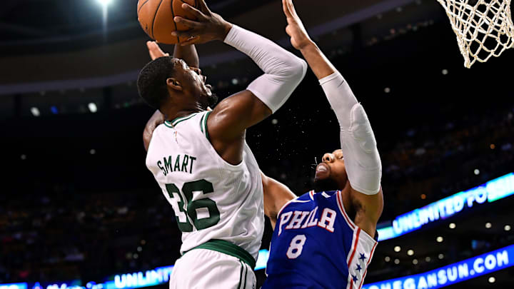 Oct 9, 2017; Boston, MA, USA; Boston Celtics guard Marcus Smart (36) attempts a shot over Philadelphia 76ers center Jahlil Okafor (8) during the first half at the TD Garden. Mandatory Credit: Brian Fluharty-Imagn Images Oct 9, 2017; Boston, MA, USA; Boston Celtics guard Marcus Smart (36) attempts a shot over Philadelphia 76ers center Jahlil Okafor (8) during the first half at the TD Garden. Mandatory Credit: Brian Fluharty-Imagn Images