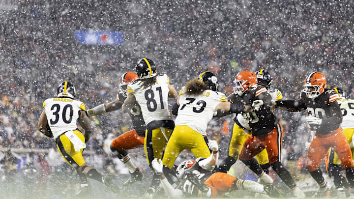 Nov 21, 2024; Cleveland, Ohio, USA; Pittsburgh Steelers running back Jaylen Warren (30) runs the ball against the Cleveland Browns during the third quarter at Huntington Bank Field Stadium. Mandatory Credit: Scott Galvin-Imagn Images
