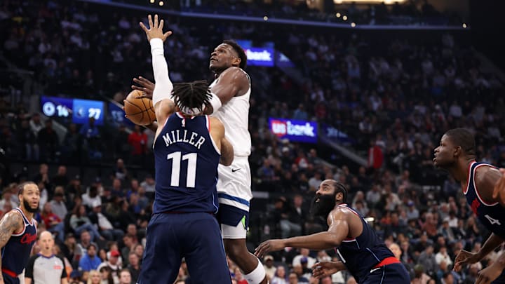 Dec 4, 2024; Inglewood, California, USA;  Minnesota Timberwolves guard Anthony Edwards (5) goes to the basket against Los Angeles Clippers guard Jordan Miller (11) during the first half at Intuit Dome. Mandatory Credit: Kiyoshi Mio-Imagn Images