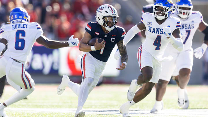 Nov 8, 2025; Tucson, Arizona, USA; Arizona Wildcats quarterback Noah Fifita (1) against the Kansas Jayhawks in the first half at Arizona Stadium. Mandatory Credit: Mark J. Rebilas-Imagn Images