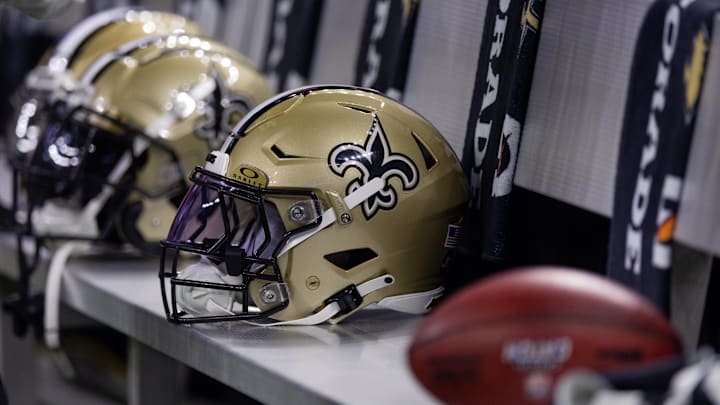 Nov 5, 2023; New Orleans, Louisiana, USA;  Detailed view of the New Orleans Saints helmets on the team bench against the Chicago Bears during the first half at the Caesars Superdome. Mandatory Credit: Stephen Lew-Imagn Images