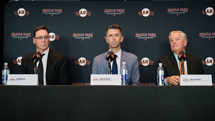 Oct 1, 2024; San Francisco, CA, USA; San Francisco Giants president of baseball operations Buster Posey (middle), manager Bob Melvin (left) and chairman Greg Johnson address the media during a press conference at Oracle Park.