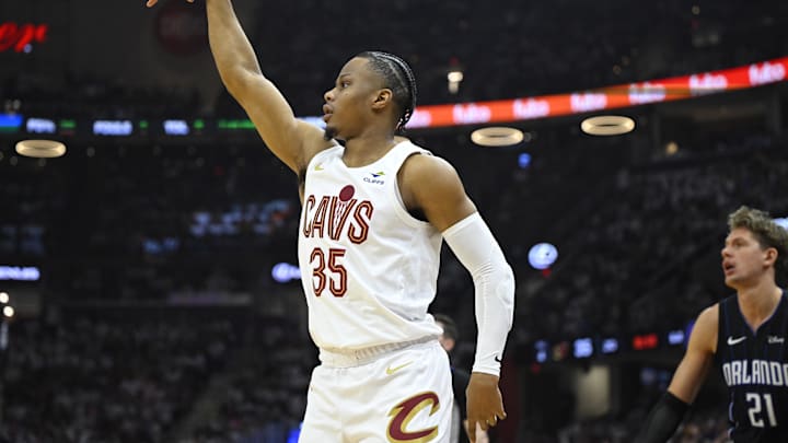 Apr 22, 2024; Cleveland, Ohio, USA; Cleveland Cavaliers forward Isaac Okoro (35) follows through on a three-point basket attempt in the second quarter against the Orlando Magic during game two of the first round of the 2024 NBA playoffs at Rocket Mortgage FieldHouse. Mandatory Credit: David Richard-Imagn Images