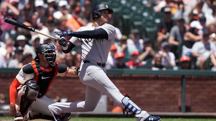 Jun 2, 2024; San Francisco, California, USA; New York Yankees right fielder Juan Soto (22) hits a home run against the San Francisco Giants during the first inning at Oracle Park.