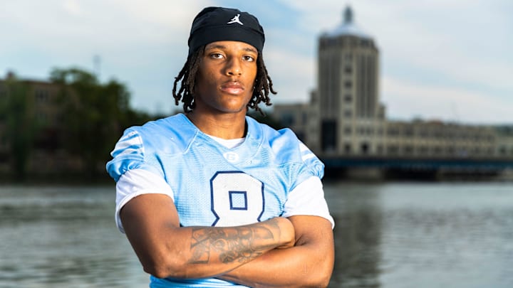 Keysan Taylor, a junior football player for Guilford High School, is pictured Aug. 15, 2025, along the Rock River in downtown Rockford.