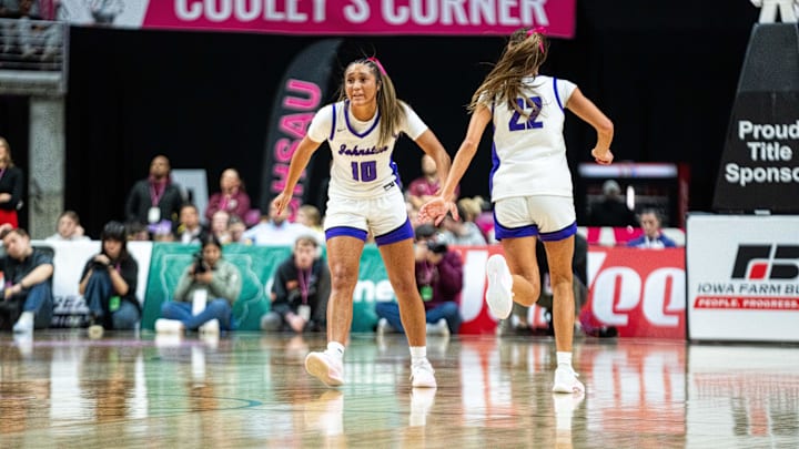 Johnston's Jenica Lewis (10) and Kelli Kalb (22) transition to defense against Ankeny on March 5, 2026, at Casey’s Center in Des Moines.
