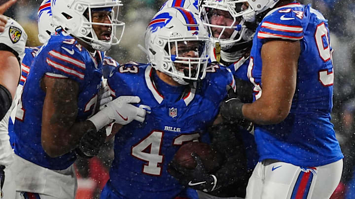 Buffalo Bills linebacker Terrel Bernard and teammates celebrate his fumble recovery during second half action at the Buffalo Bills divisional game against the Baltimore Ravens