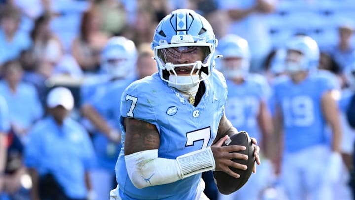 Sep 13, 2025; Chapel Hill, North Carolina, USA; North Carolina Tar Heels quarterback Gio Lopez (7) looks to pass in the third quarter at Kenan Stadium. Mandatory Credit: Bob Donnan-Imagn Images