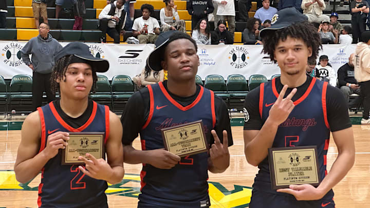 Myles Walker (left), Issac Williamson (middle) and Brayden Burries pose after winning Classic at Damien Platinum Division.