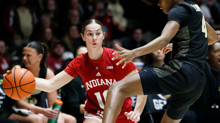 Purdue Boilermakers guard Destini Lombard (4) defends Indiana Hoosiers guard Shay Ciezki (10) Sunday, March 2, 2025, during the NCAA women’s basketball game at Mackey Arena in West Lafayette, Ind. Purdue Boilermakers guard Destini Lombard (4) defends Indiana Hoosiers guard Shay Ciezki (10) Sunday, March 2, 2025, during the NCAA women’s basketball game at Mackey Arena in West Lafayette, Ind.