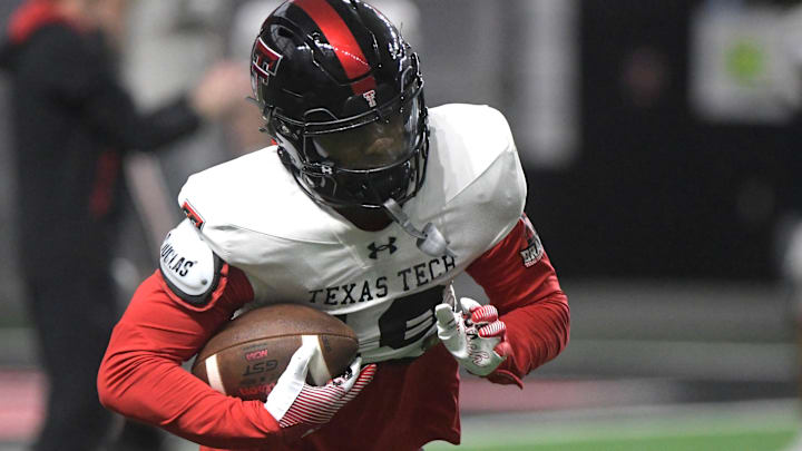 Texas Tech’s Josh Kelly does a drill during a spring practice, Tuesday, April 9, 2024, at the Sports Performance Center.