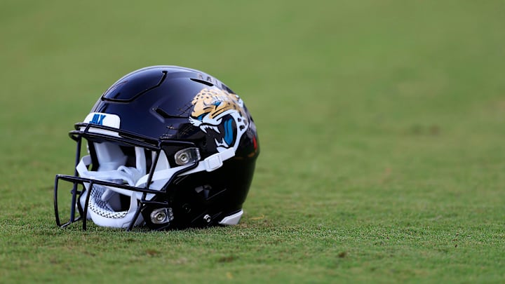A Jacksonville Jaguars helmet lies on the turf Wednesday, July 26, 2023 at Miller Electric Center at EverBank Stadium in Jacksonville, Fla. Today marked the first day of training camp for the Jacksonville Jaguars.