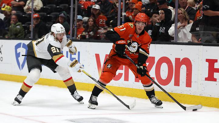 May 14, 2026; Anaheim, California, USA; Anaheim Ducks defenseman Olen Zellweger (51) controls the puck past Vegas Golden Knights center Brett Howden (21) during the third period in game six of the second round of the 2026 Stanley Cup Playoffs at Honda Center. Mandatory Credit: Kiyoshi Mio-Imagn Images May 14, 2026; Anaheim, California, USA; Anaheim Ducks defenseman Olen Zellweger (51) controls the puck past Vegas Golden Knights center Brett Howden (21) during the third period in game six of the second round of the 2026 Stanley Cup Playoffs at Honda Center. Mandatory Credit: Kiyoshi Mio-Imagn Images