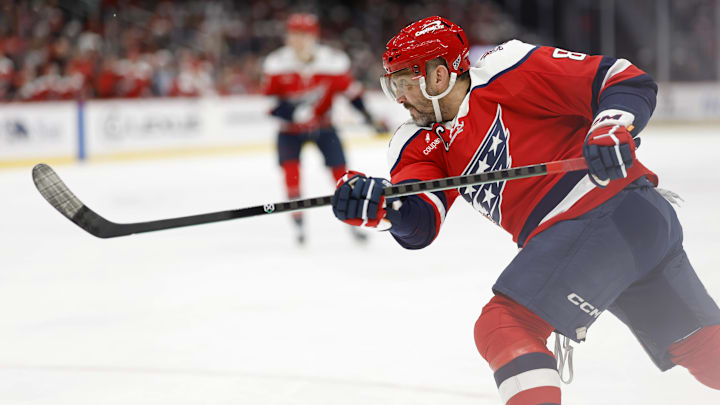 Dec 7, 2025; Washington, District of Columbia, USA; Washington Capitals left wing Alex Ovechkin (8) shoots the puck against the Columbus Blue Jackets during the third period at Capital One Arena. Mandatory Credit: Geoff Burke-Imagn Images