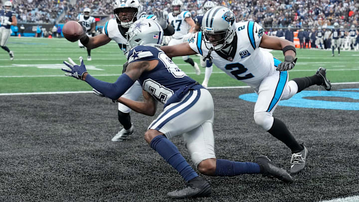 Dallas Cowboys WR Jalen Brooks catches a touchdown pass against Carolina Panthers S Xavier Woods and CB Michael Jackson. Dallas Cowboys WR Jalen Brooks catches a touchdown pass against Carolina Panthers S Xavier Woods and CB Michael Jackson.