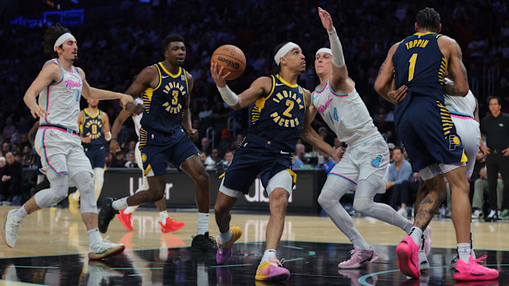 Feb 28, 2025; Miami, Florida, USA; Indiana Pacers guard Andrew Nembhard (2) drives to the basket against Miami Heat guard Tyler Herro (14) during the second quarter at Kaseya Center. Mandatory Credit: Sam Navarro-Imagn Images Feb 28, 2025; Miami, Florida, USA; Indiana Pacers guard Andrew Nembhard (2) drives to the basket against Miami Heat guard Tyler Herro (14) during the second quarter at Kaseya Center. Mandatory Credit: Sam Navarro-Imagn Images