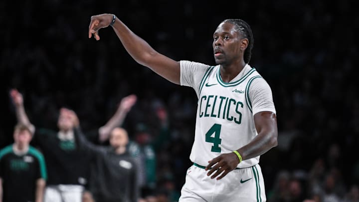 Mar 15, 2025; Brooklyn, New York, USA; Boston Celtics guard Jrue Holiday (4) reacts after making a three point shot ]against the Brooklyn Nets during the second half at Barclays Center. Mandatory Credit: John Jones-Imagn Images