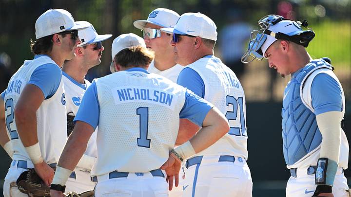 Jun 5, 2026; Chapel Hill, NC, USA;  North Carolina Tar Heels head coach Scott Forbes makes a visit to the mound in the seventh inning against the USC Trojans at Boshamer Stadium. Mandatory Credit: Zachary Taft-Imagn Images
