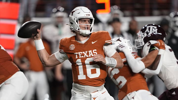 Texas Longhorns quarterback Arch Manning throws a pass during the first half against the Texas A&M Aggies
