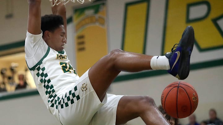 Freedom High School's Donovan Davis (24) against Little Chute High School during their boys basketball game in Freedom, Wisconsin on Tuesday, January 6, 2026. Freedom defeated Little Chute 65-56.