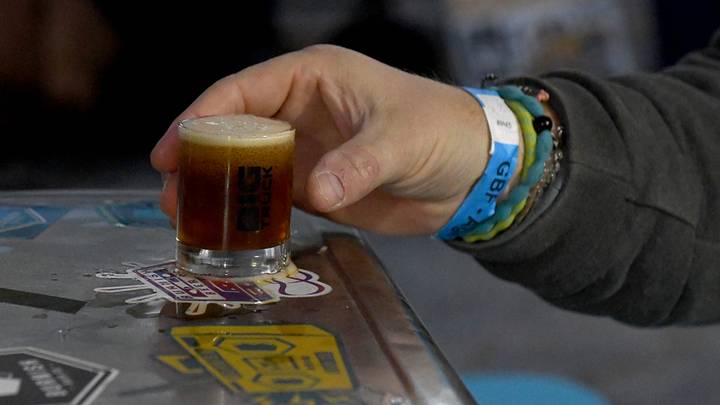 Reaching for a sample beer