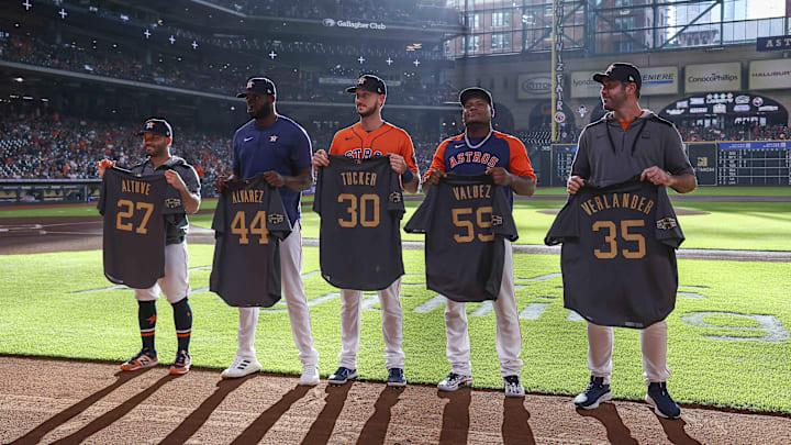 Jul 15, 2022; Houston, Texas, USA; Houston Astros Jose Altuve (27) and Yordan Alvarez (44) and Framber Valdez (59) and Justin Verlander (35) display All-Star jerseys before the game against the Oakland Athletics at Minute Maid Park. 