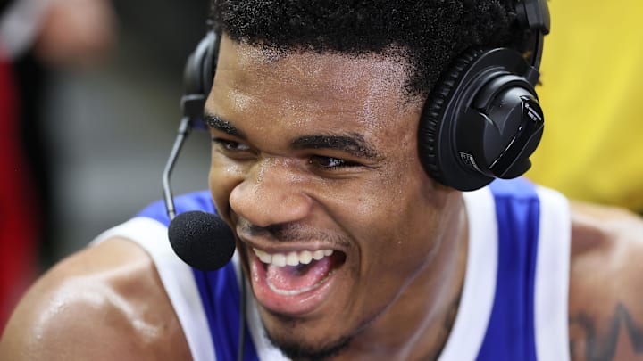 Jan 31, 2026; Fayetteville, Arkansas, USA; Kentucky Wildcats guard Otega Oweh (00) is interviewed after the game against the Arkansas Razorbacks at Bud Walton Arena. Kentucky won 85-77. Mandatory Credit: Nelson Chenault-Imagn Images