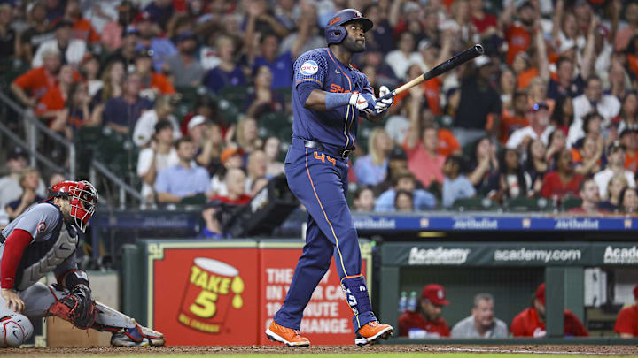 Yordan Alvarez watches a home run fly out