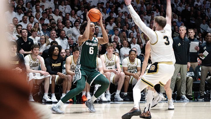 Feb 26, 2026; West Lafayette, Indiana, USA; Michigan State Spartans forward Jordan Scott (6) looks to shoot the ball as Purdue Boilermakers guard Braden Smith (3) defends during the first half at Mackey Arena. Mandatory Credit: Jacob Musselman-Imagn Images Feb 26, 2026; West Lafayette, Indiana, USA; Michigan State Spartans forward Jordan Scott (6) looks to shoot the ball as Purdue Boilermakers guard Braden Smith (3) defends during the first half at Mackey Arena. Mandatory Credit: Jacob Musselman-Imagn Images