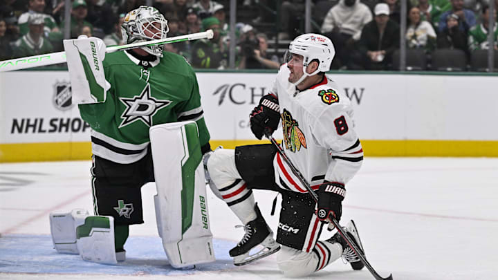 Nov 7, 2024; Dallas, Texas, USA; Dallas Stars goaltender Jake Oettinger (29) and Chicago Blackhawks center Ryan Donato (8) get up off the ice during the third period at the American Airlines Center. Mandatory Credit: Jerome Miron-Imagn Images Nov 7, 2024; Dallas, Texas, USA; Dallas Stars goaltender Jake Oettinger (29) and Chicago Blackhawks center Ryan Donato (8) get up off the ice during the third period at the American Airlines Center. Mandatory Credit: Jerome Miron-Imagn Images