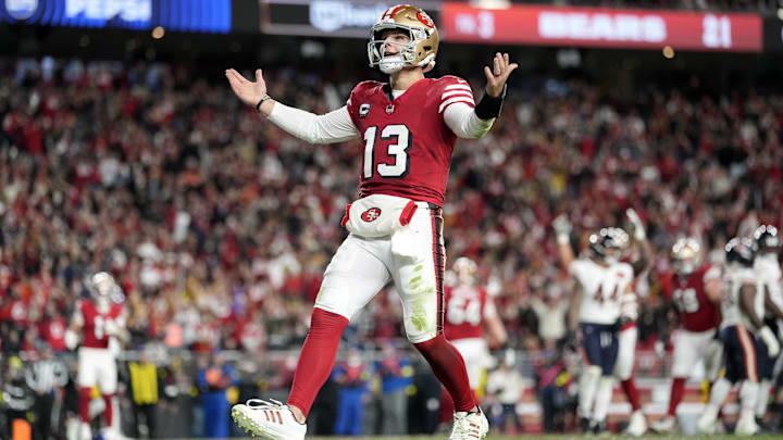 Dec 28, 2025; Santa Clara, California, USA; San Francisco 49ers quarterback Brock Purdy (13) celebrates after scoring a touchdown against the Chicago Bears in the first half at Levi's Stadium. Mandatory Credit: Kyle Terada-Imagn Images