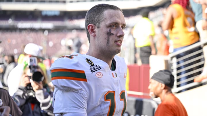 Miami Hurricanes quarterback Carson Beck (11) walks off the field after the Hurricanes win over the Texas A&M Aggies at Kyle Field.