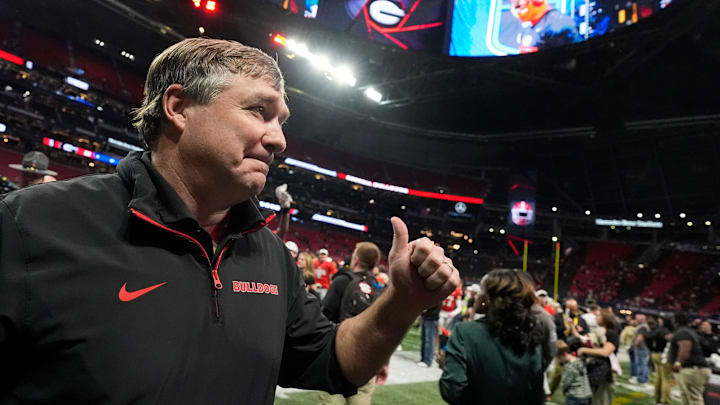 Georgia coach Kirby Smart celebrates after the winning the SEC championship game against Texas in Atlanta, on Saturday, Dec. 7, 2024. Georgia won 22-19. Georgia coach Kirby Smart celebrates after the winning the SEC championship game against Texas in Atlanta, on Saturday, Dec. 7, 2024. Georgia won 22-19.