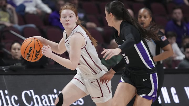 March 11, 2024; Las Vegas, NV, USA; Santa Clara Broncos guard Tess Heal (34) dribbles the basketball against Portland Pilots guard Emme Shearer (5) during the second half in the semifinals of the WCC Basketball Championship at Orleans Arena. Mandatory Credit: Kyle Terada-Imagn Images March 11, 2024; Las Vegas, NV, USA; Santa Clara Broncos guard Tess Heal (34) dribbles the basketball against Portland Pilots guard Emme Shearer (5) during the second half in the semifinals of the WCC Basketball Championship at Orleans Arena. Mandatory Credit: Kyle Terada-Imagn Images